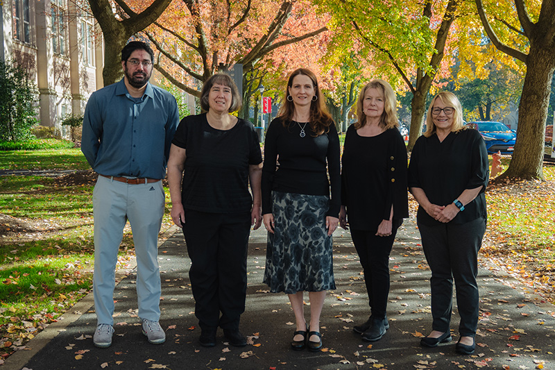 Group photo of five staff members who work in the Mailroom office.