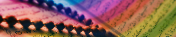 Quran with rainbow colors over top of the image